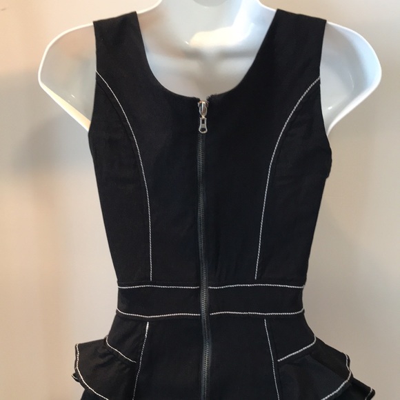 Bebe mechanical fabric peplum dress. - Picture 7 of 11